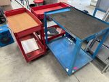many different types of tables and carts in a warehouse