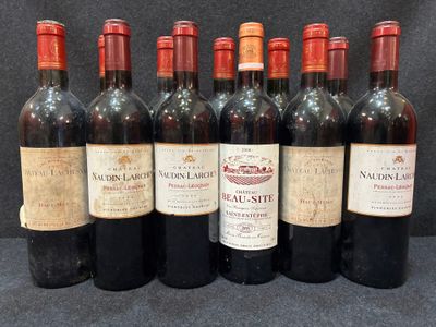 six bouteilles de vin sont alignées sur une table