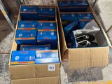 many boxes of electronic equipment sitting on the floor