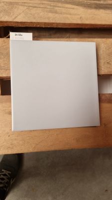 a picture of a piece of paper on top of a wooden table