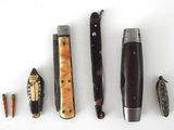 five different types of knives on a white surface
