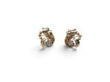 a pair of gold earrings with diamonds on a white background