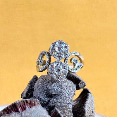 a ring that is sitting on top of a shell