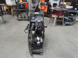 an image of a welding machine in a workshop