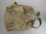 a tan bag with a number on it sitting on a table