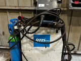 une machine qui est dans le garage