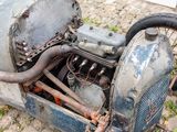 an old motorcycle that is sitting on the ground