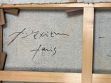 two wooden frames with writing on them on the wall