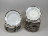 many plates stacked on top of each other on a table