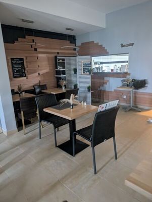 a dining room with a table and chairs in it