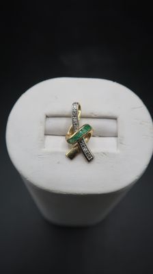 a close up of a ring with a cross on it