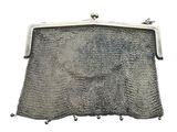 an old silver mesh purse on a white background