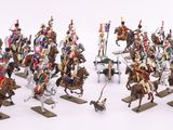 a lot of figurines of soldiers on horses