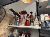 a shelf full of liquor bottles and bottles on it