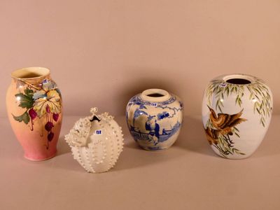 three vases sitting next to each other on a table