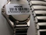 a watch that has a barcode on the back of it