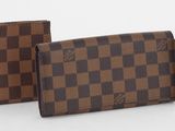 étui-portefeuille Louis Vuitton à motif damier marron et noir
