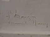 a close up of a sign on a wall