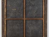 an old wooden window frame with four panes of glass in it