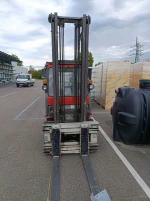 a forklift that is parked in a parking lot
