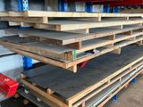 many pallets that are stacked up in the warehouse