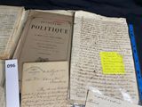 many old papers that are on a table