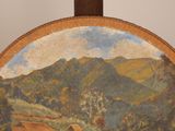 a painting on the back of a chair with a painting on it