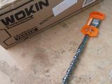 a box of workin tools on the floor next to it