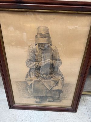 painting of a woman sitting on the ground with a hat on her head