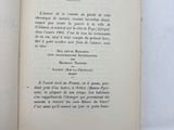an open book with a picture of a cat on it