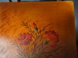 a picture of a painting on a wooden table