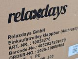 packaging of a box of relaxdays products sitting on top of a wooden table