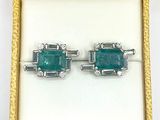 an image of a pair of emerald and diamond earrings in a box
