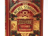un livre rouge orné de lettres dorées et d'illustrations