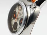 a watch that is sitting on top of a strap