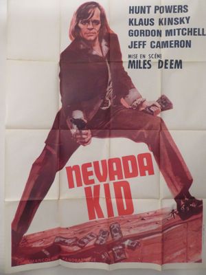 L'affiche du film « Nevada Kid » est accrochée au mur.