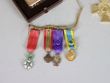 a box with medals and a medal on a table