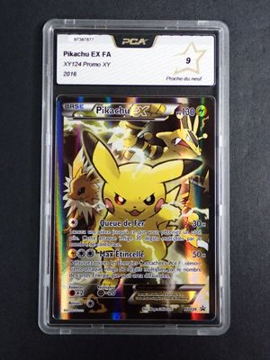 a close up of a pokemon card in a plastic case