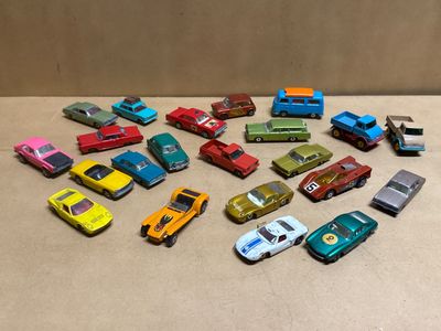 a lot of toy cars that are on the table