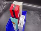a blue tray with two boxes and a toothbrush on it