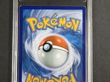the pokemon new world card is in a plastic case