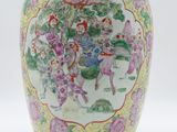 a vase with a picture of a man riding a horse on it