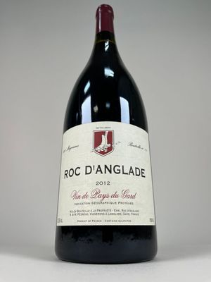 a bottle of wine that is sitting on a table