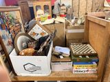 a wooden table with a lot of items on top of it