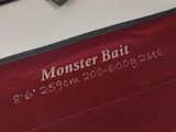 a red box with a pair of scissors on top of it