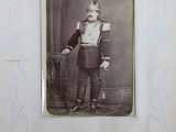 an old photo of a man dressed in a uniform