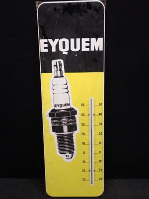 une image représentant un panneau jaune et noir sur lequel figure un thermomètre