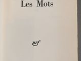 an open book with a black and white title on it