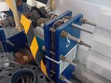 a machine that is sitting on a table with a lot of wires