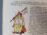 an old book with a picture of a man holding a stick